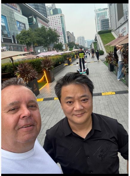 Walking with client in commercial district